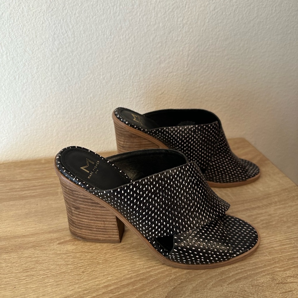 Mark Fisher, black and white heels
